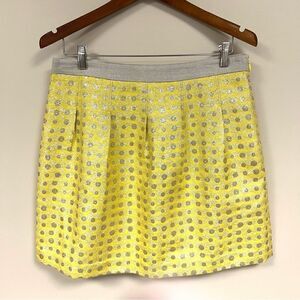 Loft yellow shimmer polka dot pleated skirt.  Size 8
